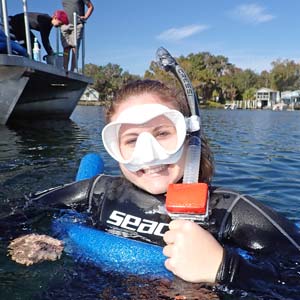 student in a wetsuit