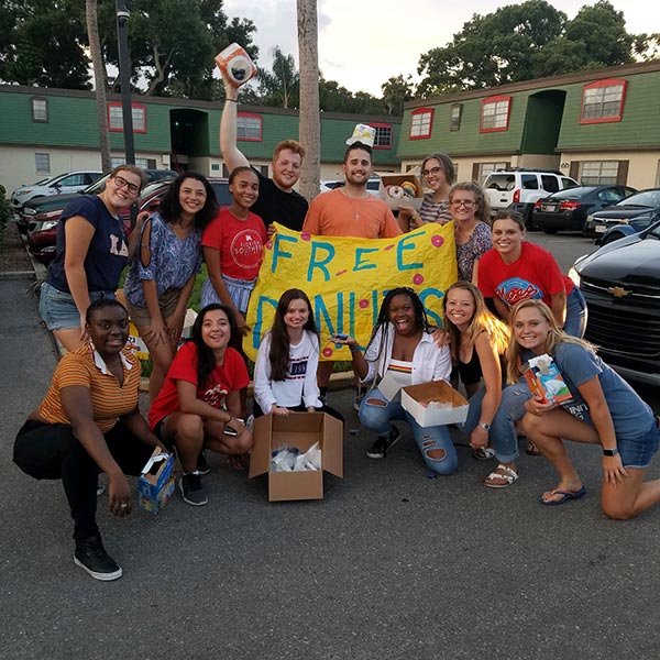 Students participating in an event outside their dorms